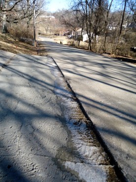 The ice frozen across our driveway.