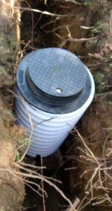 The new water line leading into, and out of, the meter pit.  All it needs now is a meter.