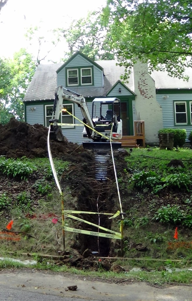 The Trench taped off to wait for the city inspector in the morning.